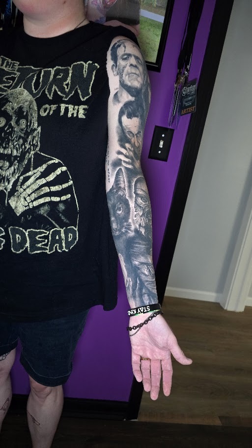 Inner view of a black and grey classic horror sleeve by Billy