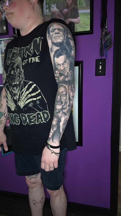 Outer view of a black and grey classic horror sleeve by Billy