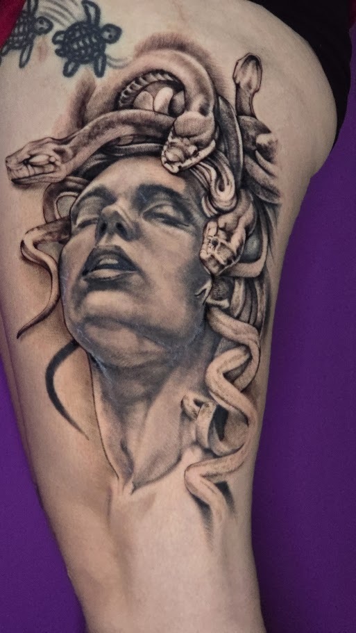 Black and grey Medusa thigh tattoo by Billy